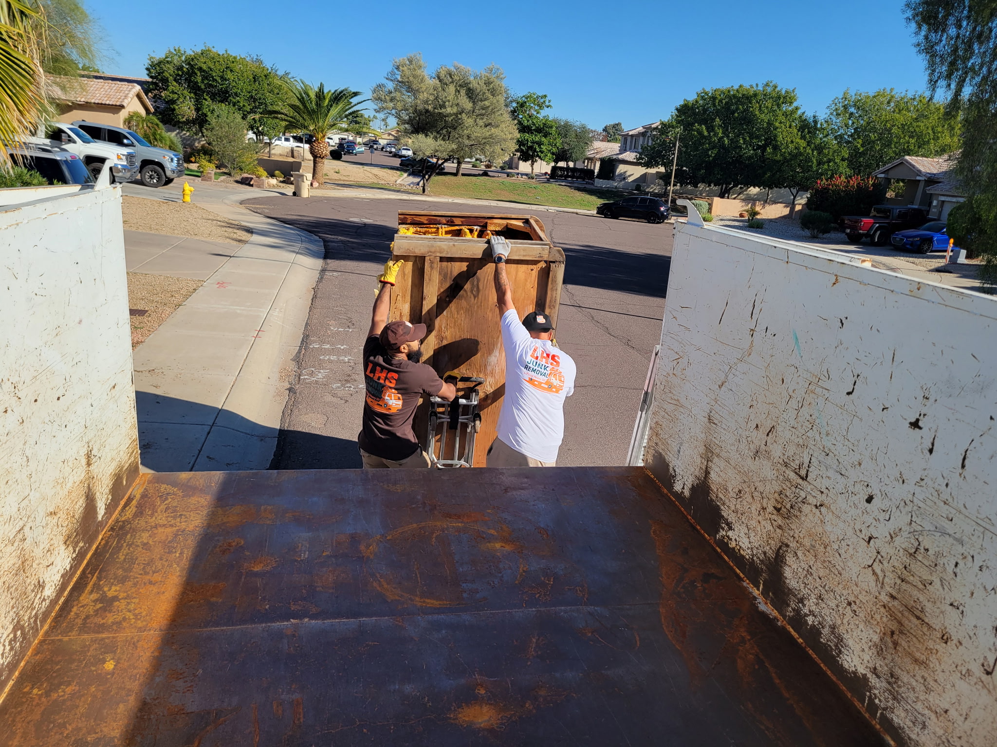 Men Carrying Junk